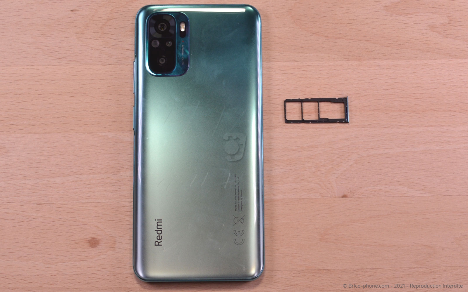 Changement de la vitre arrière sur Redmi Note 10 photo 3