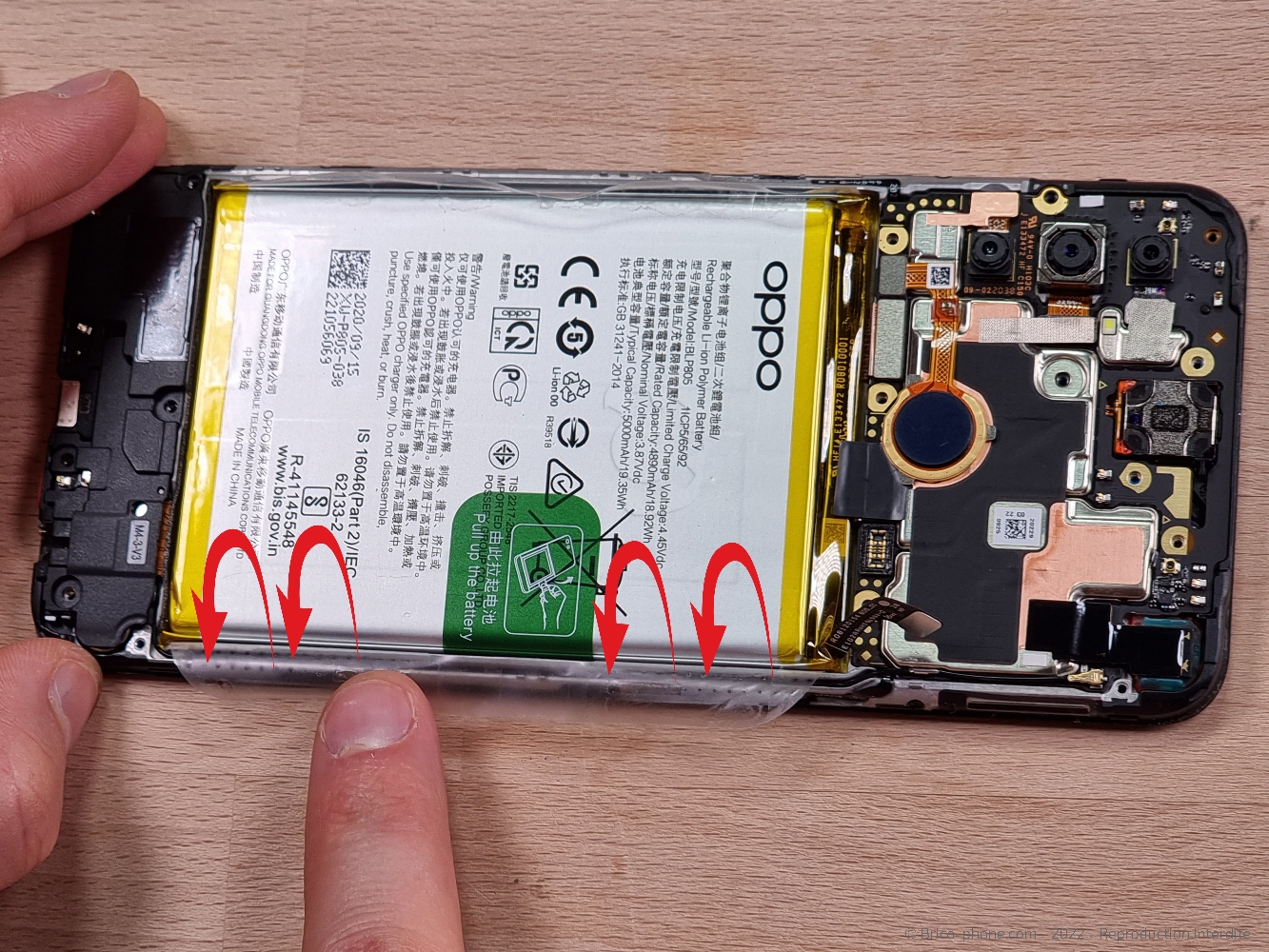 Changement de batterie sur A53S photo 2