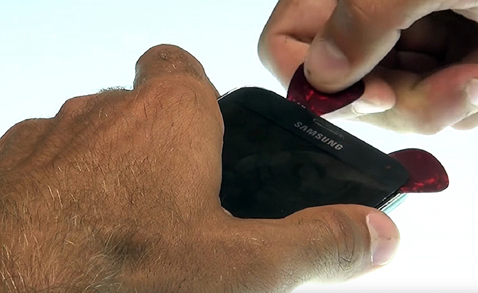 Changement d'écran (vitre+AMOLED) sur Galaxy S5 NEO photo 3