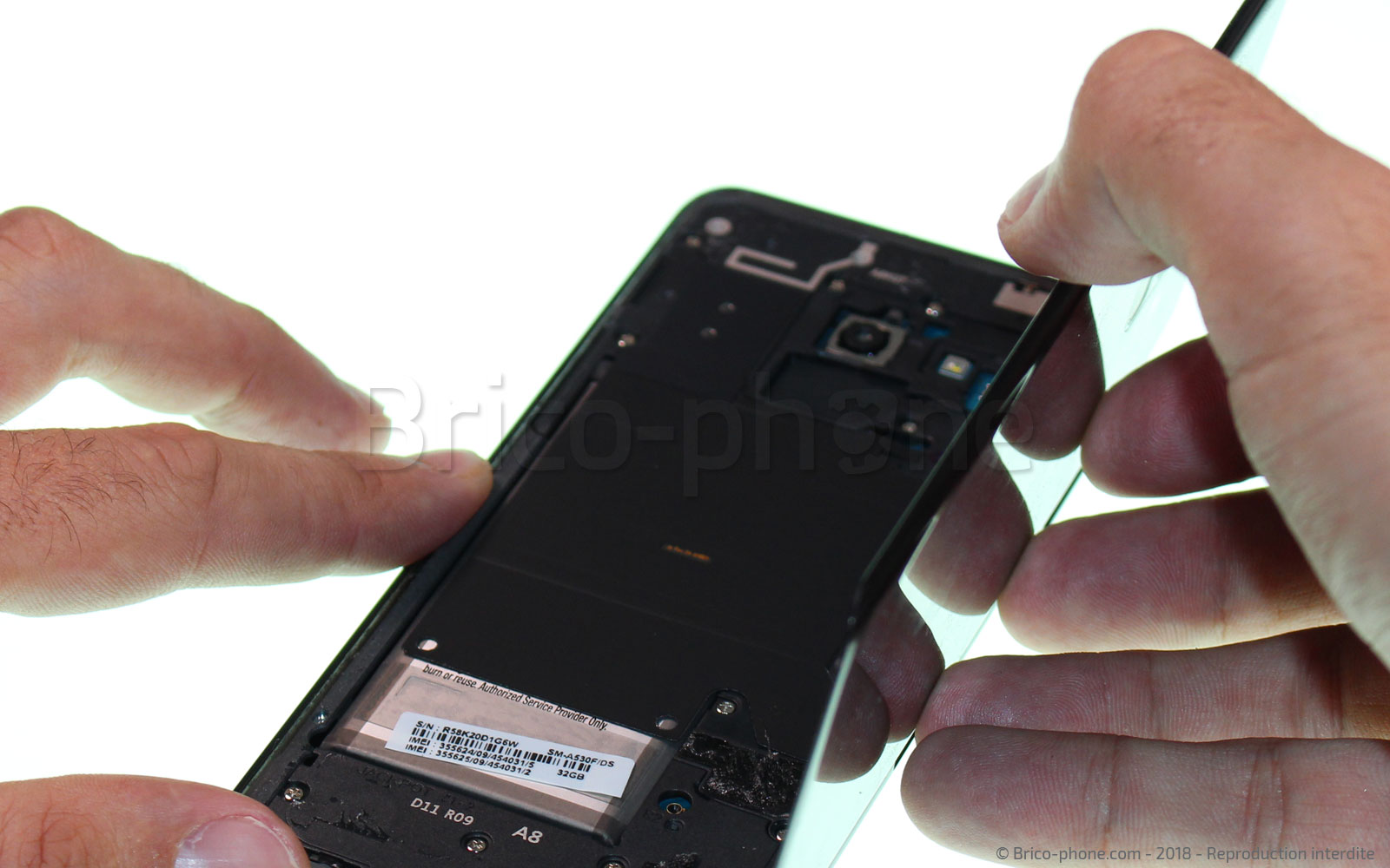 Changement de batterie sur Galaxy A8 2018 photo 1