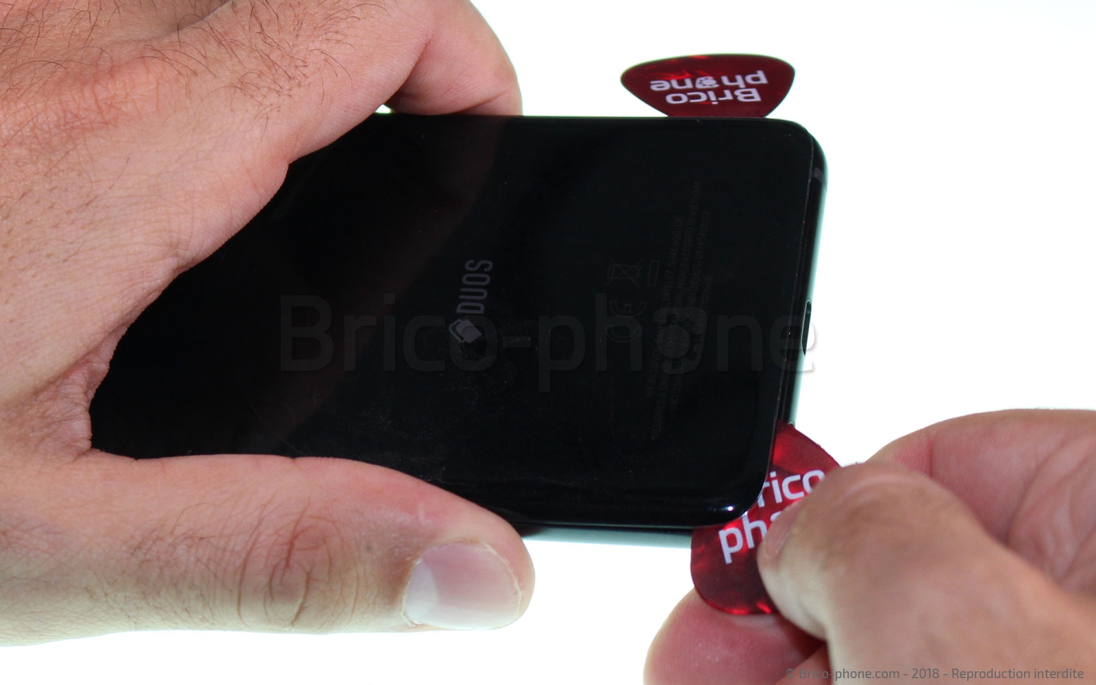 Changement du haut-parleur externe / antenne NFC sur Galaxy A8 2018 photo 1