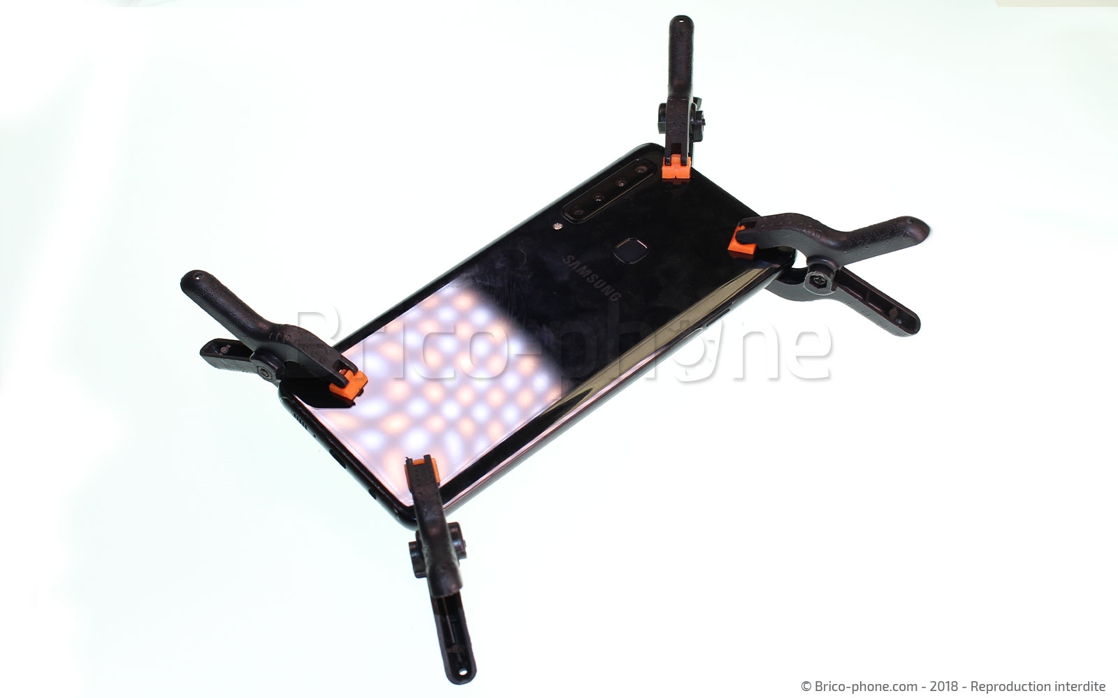 Changement de vitre arrière sur Galaxy A9 2018 photo 4