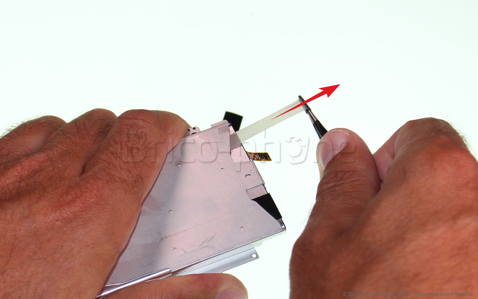 Changement de bloc haut-parleur externe sur Xperia XZ2 photo 2