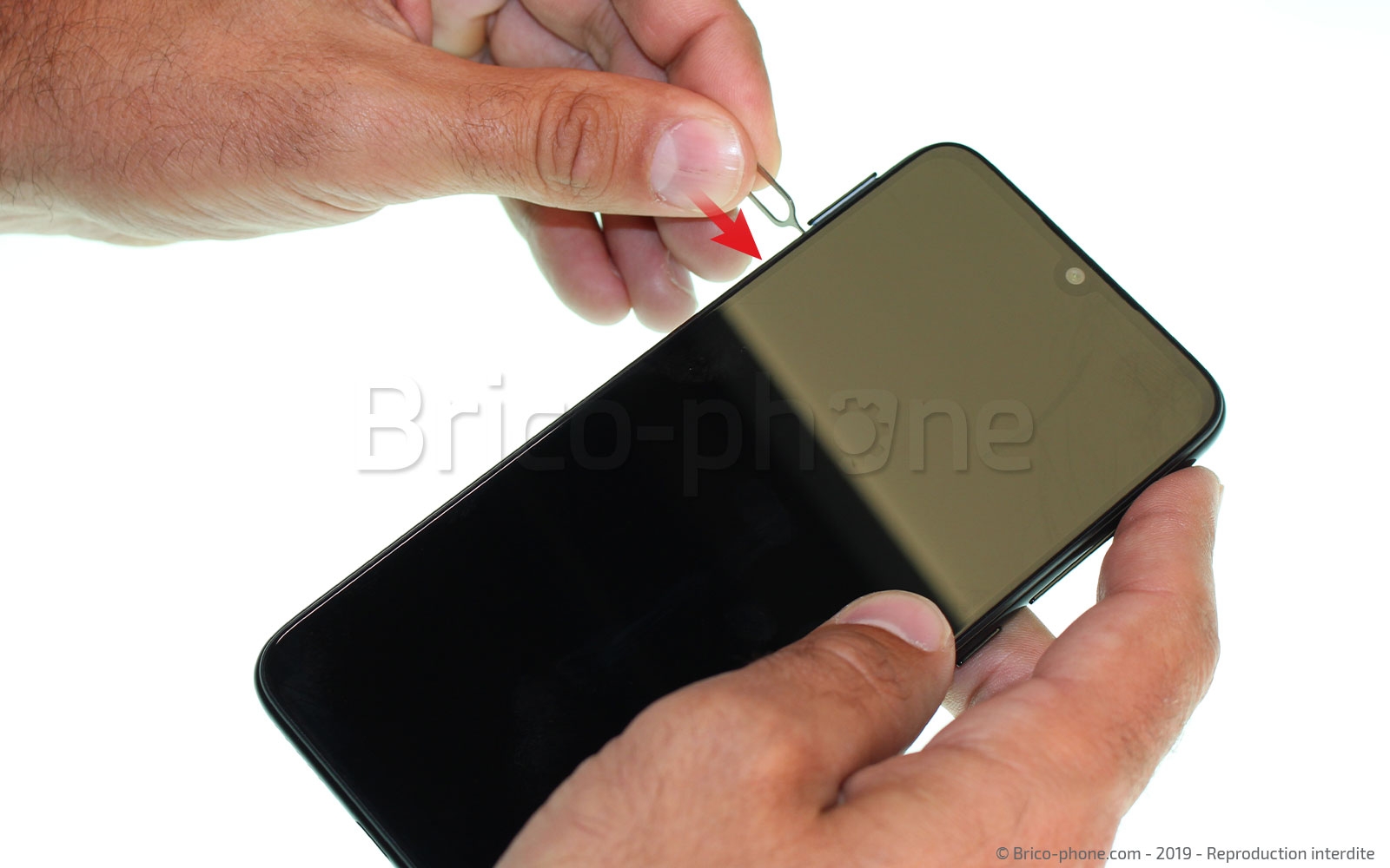 Changement de vitre arrière sur Redmi Note 7 photo 1