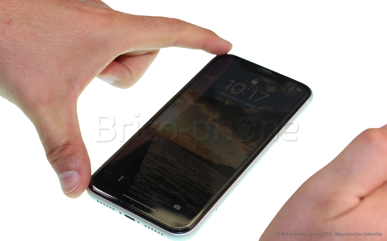 Pose d'une protection en verre trempé photo 1