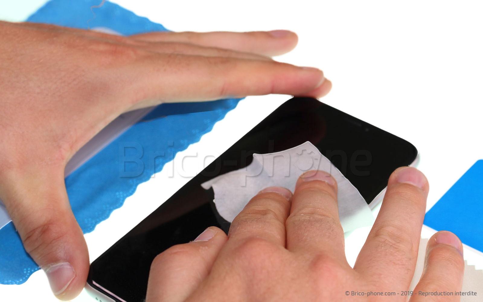 Pose d'une protection en verre trempé photo 2