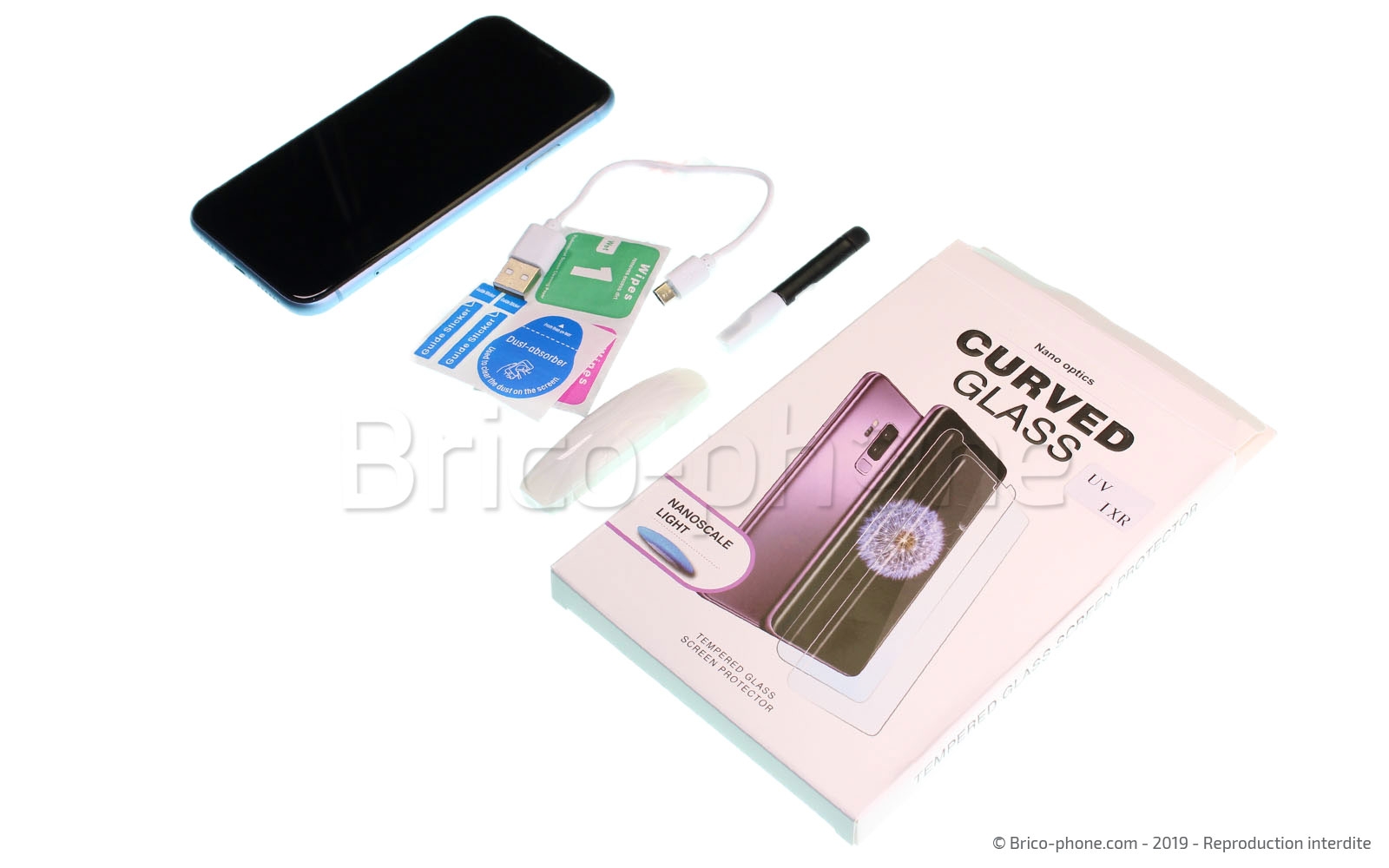 Pose d'une protection en verre trempé à fixation UV photo 1