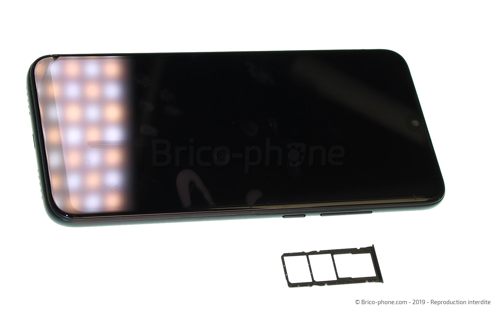 Changement de vitre arrière sur Redmi 7 photo 4