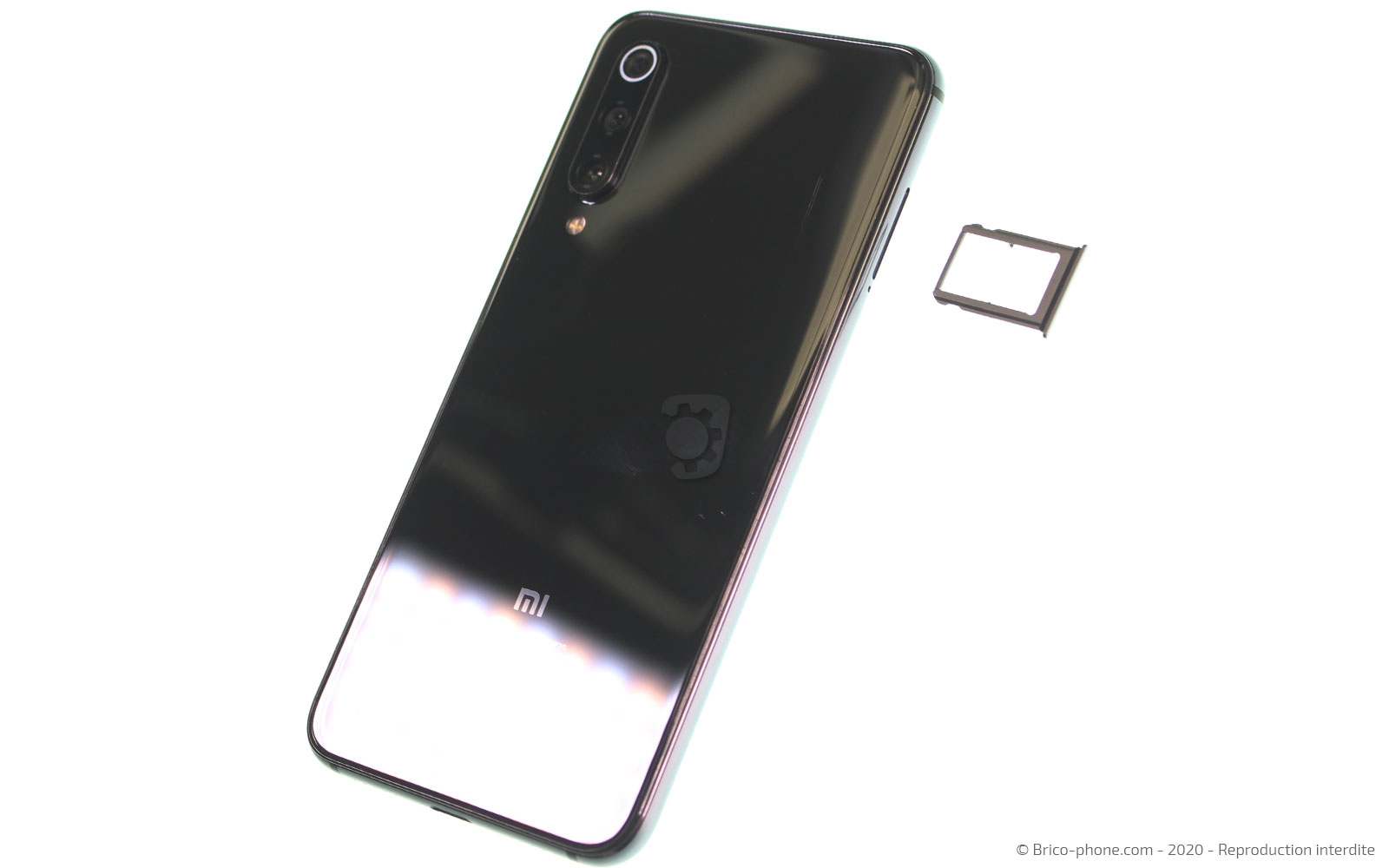 Changement de la vitre arrière sur Mi 9 SE photo 4